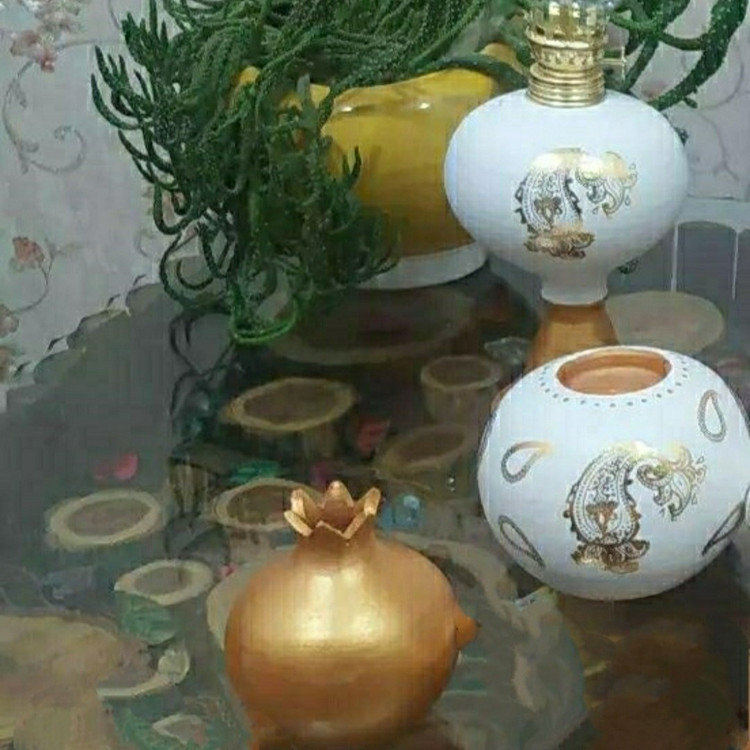 ست تزیینی (چراغ گردسوز ، انار ، شمعدان توپی ) سفالی