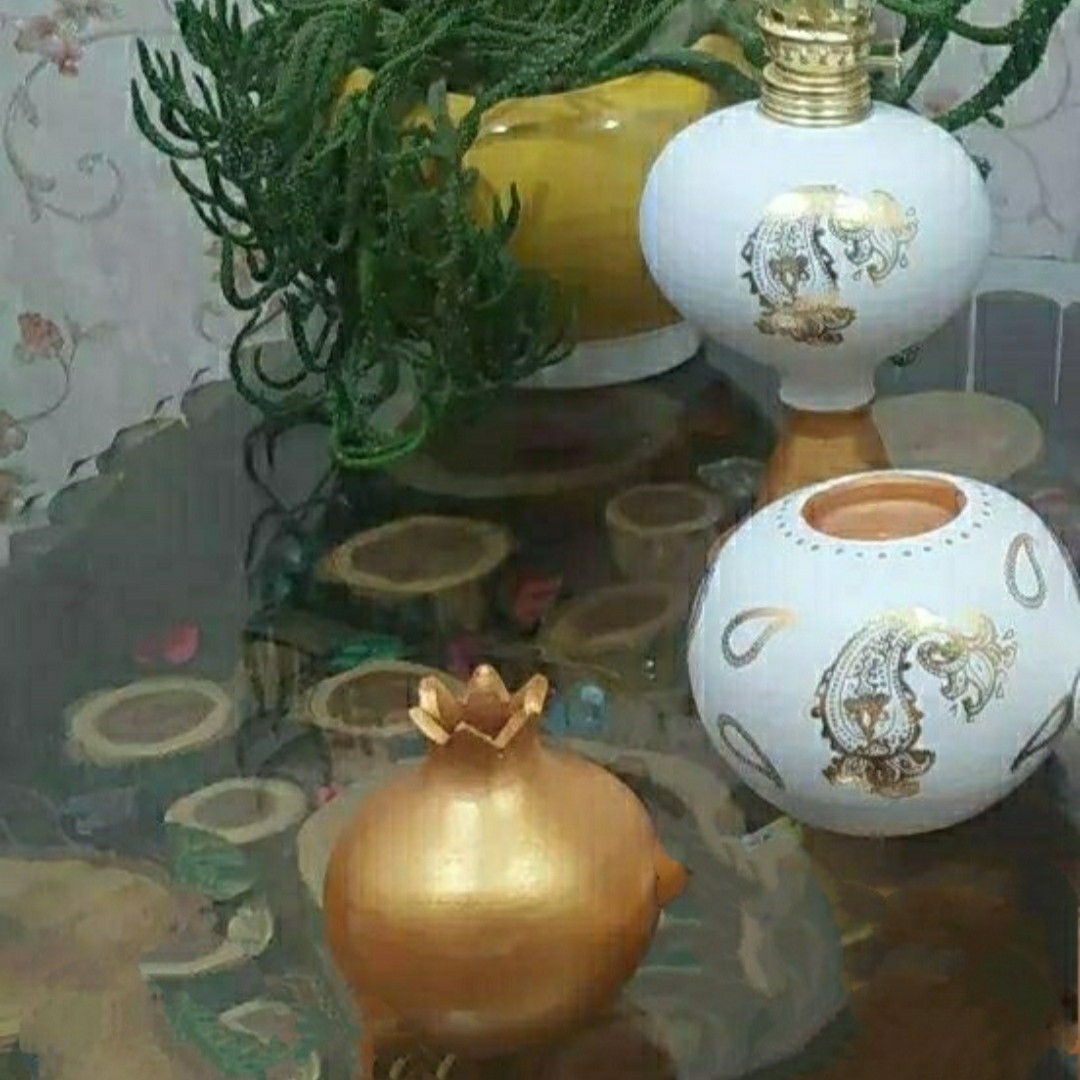ست تزیینی (چراغ گردسوز ، انار ، شمعدان توپی ) سفالی